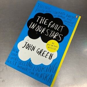The Fault in Our Stars by: John Green, paperback book